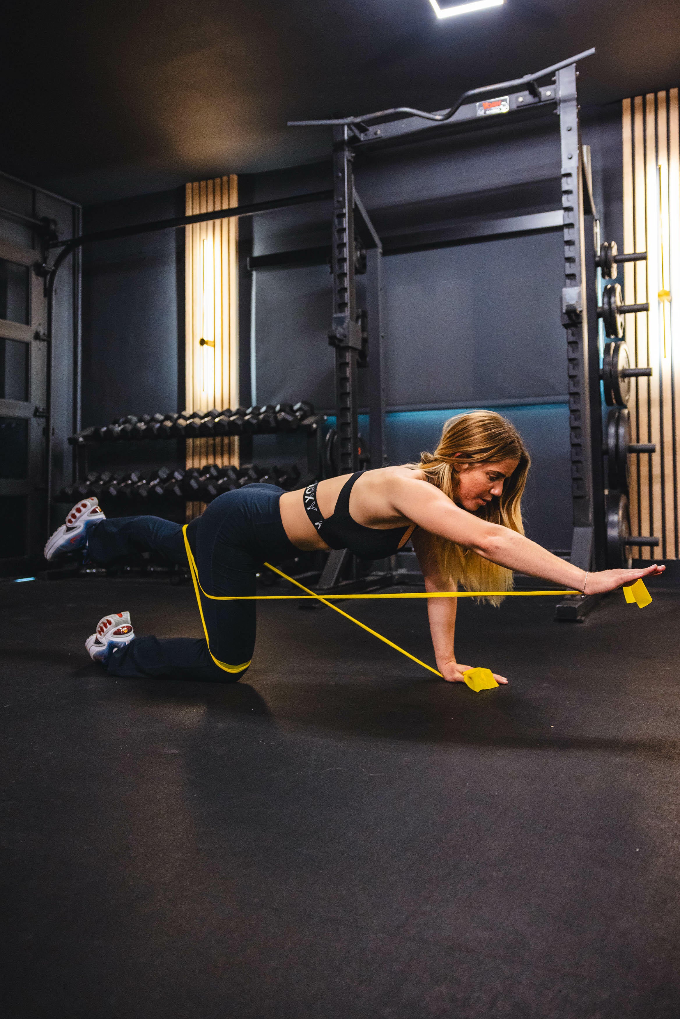 Olympic Gold Medalist Caroline Marks in a prone position with Pro Balance Bands wrapped around her legs.