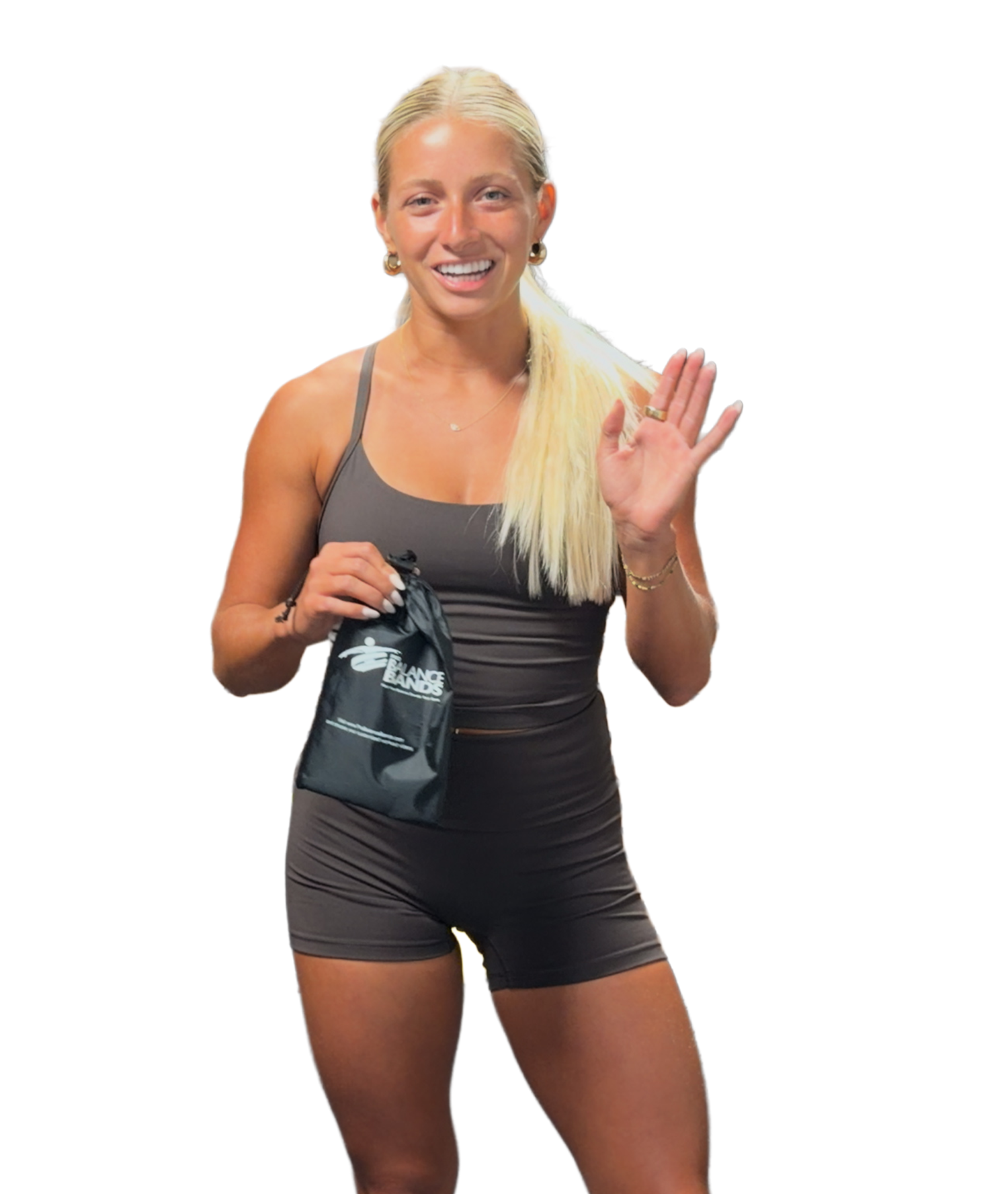 Trainer Tom Allan holding up his set of Pro Balance Bands while wearing a black Nike shirt