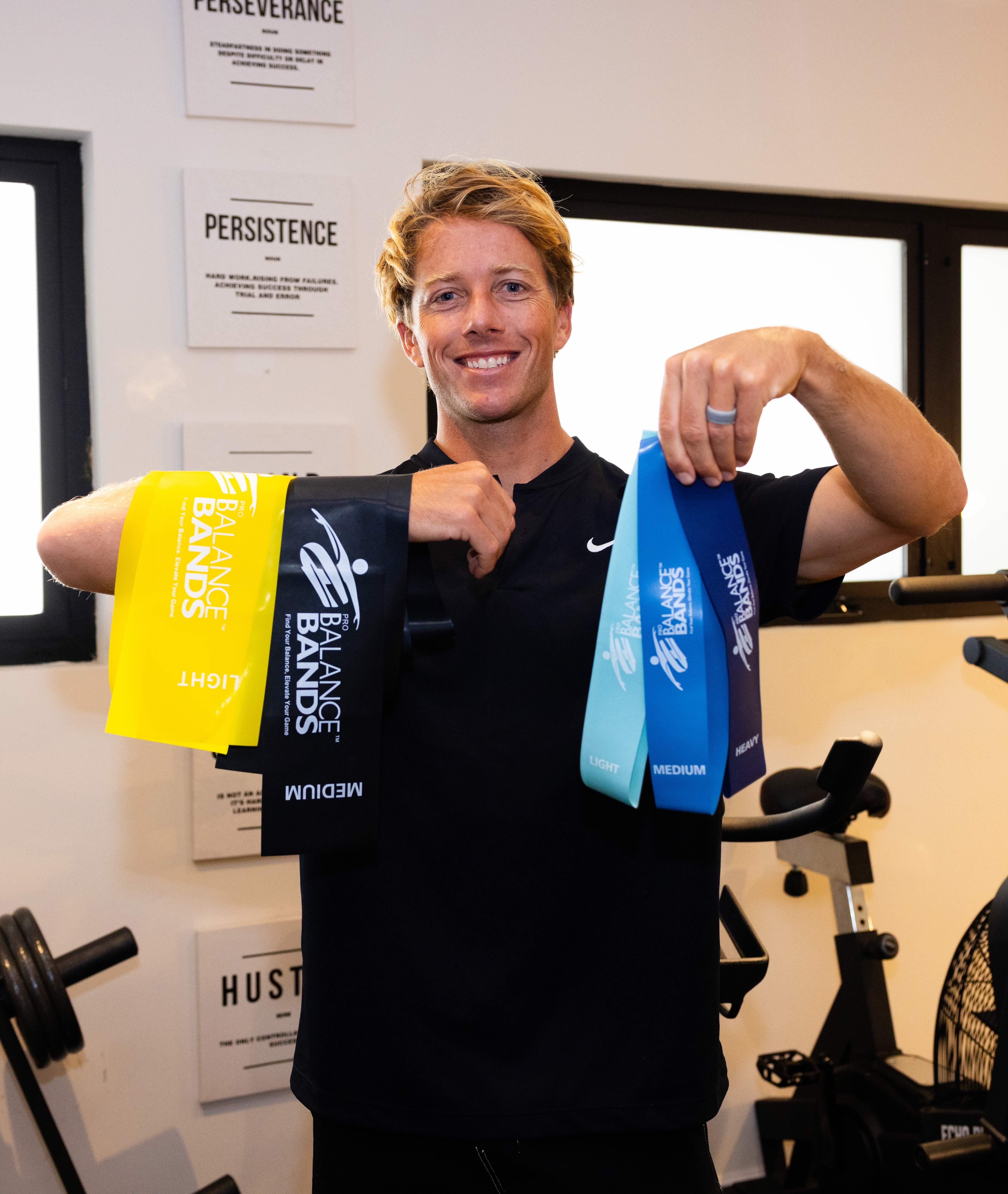 Tom Allan holding a full set of Pro Balance Bands